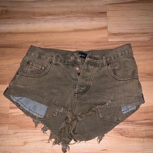 Army green tattered shorts, size 4 SUPER CUTE ON